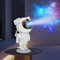 Astronaut lamp with remote control against a colorful galaxy background